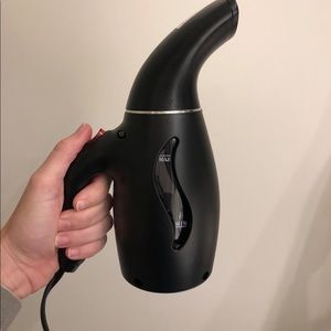Portable clothes steamer